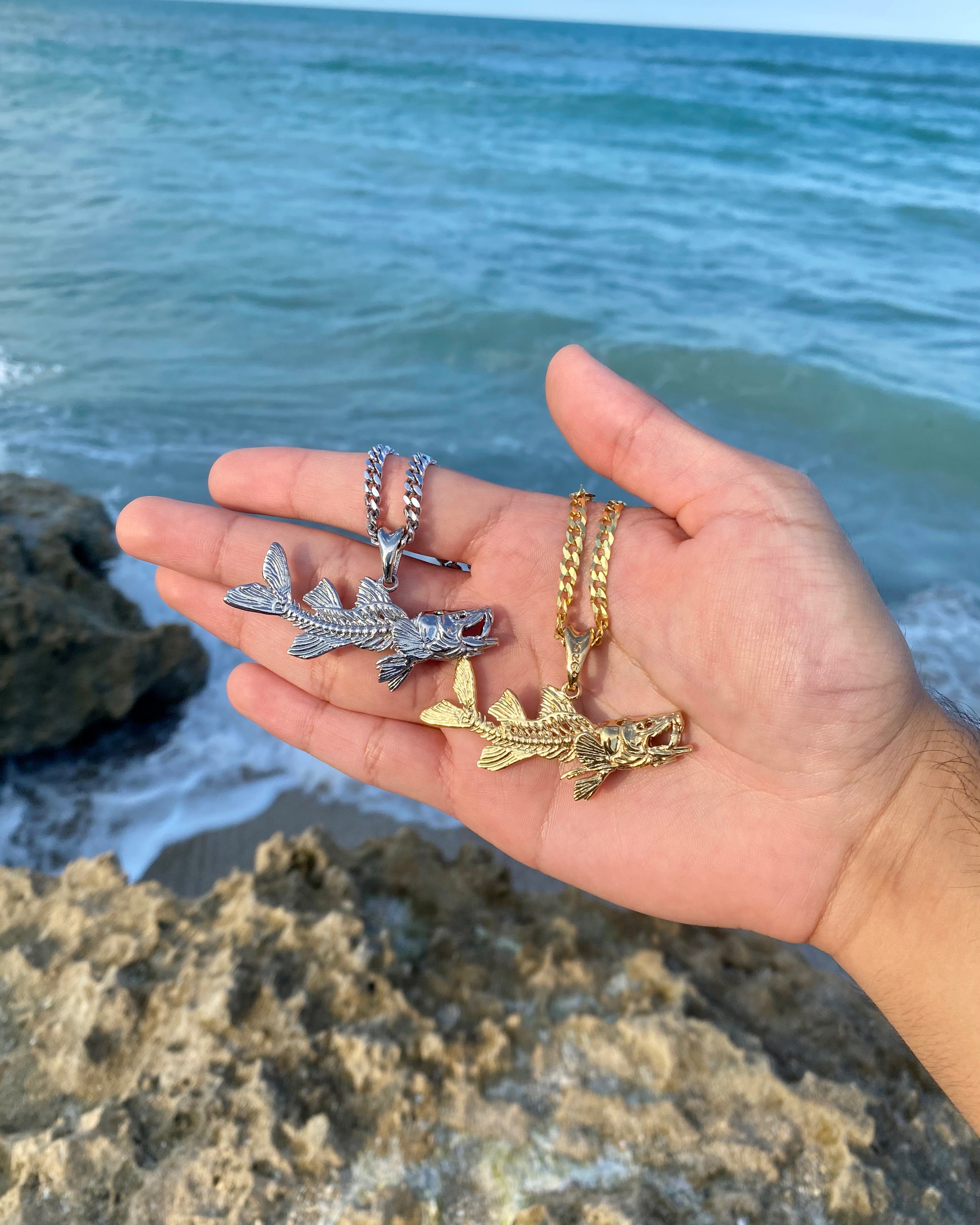 silver and gold vermeil snook skeleton fish necklaces by Castil