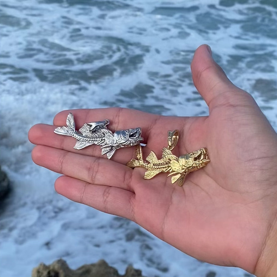 silver and gold vermeil snook skeleton pendants by Castil