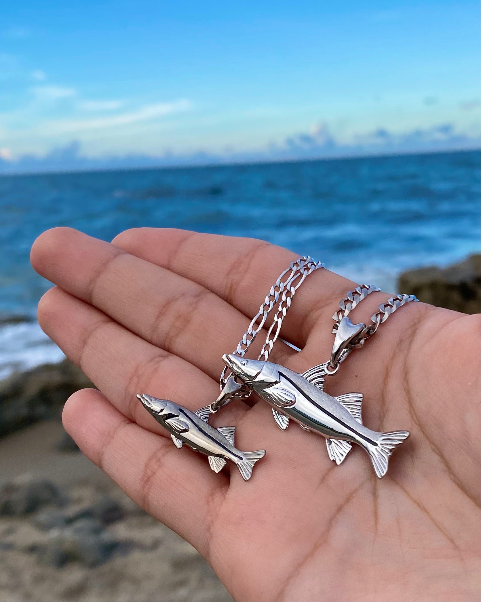 Standard and Small size Snook necklaces in silver by Castil.