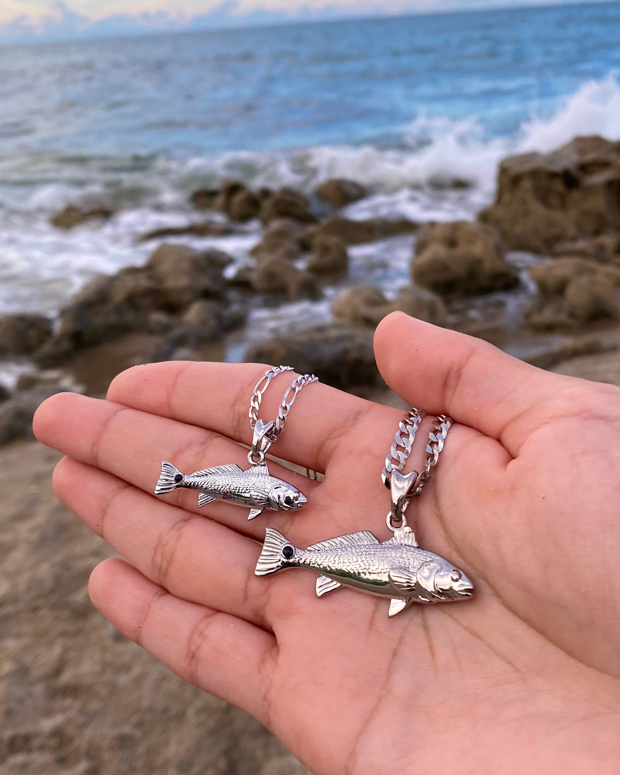 Standard and Small size Redfish necklaces in silver by Castil.